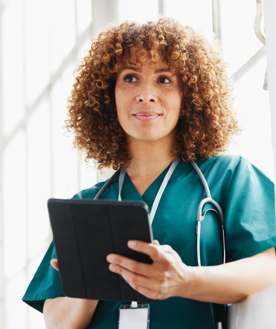 Mixed ethnicity female in nursing uniform representing Serostim® Patient AXIS Center nurse product specialist