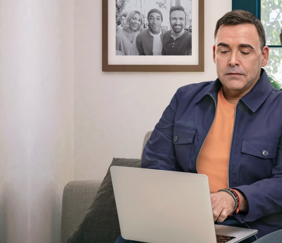 Male reviewing resources on laptop, not actual Serostim® patient