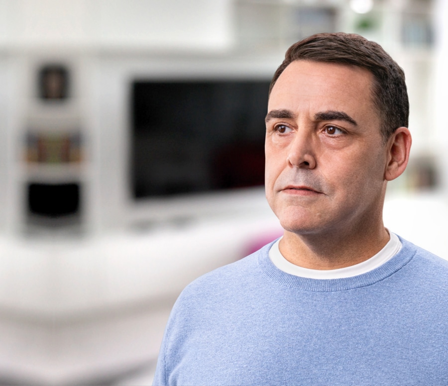 White male in a blue sweater, not actual Serostim® patient